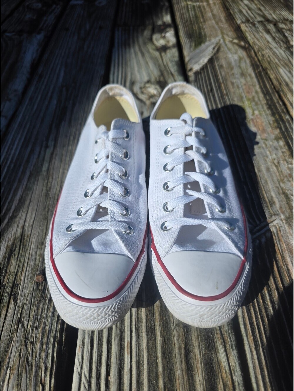 Converse Chuck Taylor All Star Optical White Low-Top Sneakers.